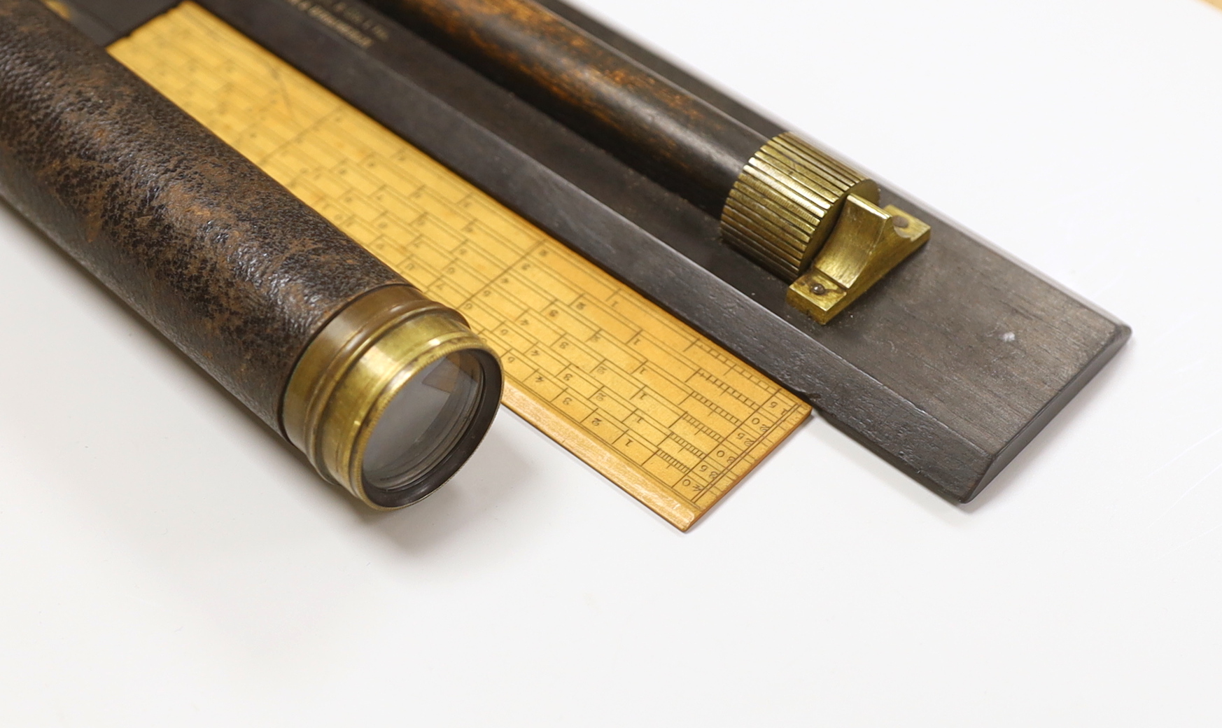 A ruler by B.J. Hall, two others and a three draw telescope, telescope 42 cms fully drawn